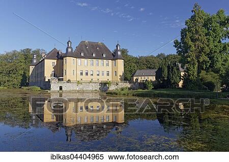 Schloss Dyck Castle with water reflection in moat, Jüchen, Niederrhein, North Rhine-Westphalia, Germany, Europe View Large Photo Image Stock Photography - Schloss Dyck Castle with water reflection in moat, Jüchen, Niederrhein, North Rhine-Westphalia, Germany, Europe. Fotosearch