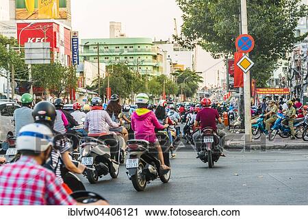 Scooter drivers in heavy traffic, Ho Chi Minh City, Vietnam, Asia View Large Photo Image Stock Image - Scooter drivers in heavy traffic, Ho Chi Minh City, Vietnam, Asia. Fotosearch