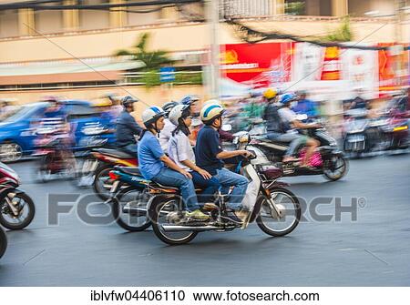 Scooter drivers in heavy traffic, motion blur, Ho Chi Minh City, Vietnam, Asia View Large Photo Image Stock Image - Scooter drivers in heavy traffic, motion blur, Ho Chi Minh City, Vietnam, Asia. Fotosearch