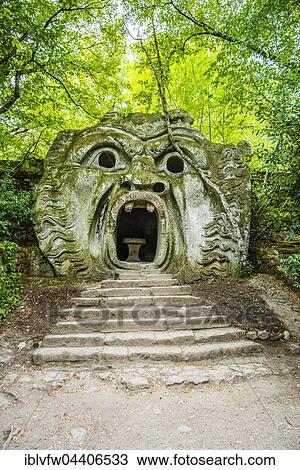 Sculpture of Orcus mouth, Sacro Bosco, Park of the Monsters, Bormazo, Viterbo, Italy, Europe View Large Photo Image Stock Image - Sculpture of Orcus mouth, Sacro Bosco, Park of the Monsters, Bormazo, Viterbo, Italy, Europe. Fotosearch
