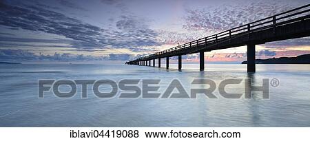 Stock Photo - Sea pier at dawn, Binz Seaside Resort, Rügen, Mecklenburg-Western Pomerania, Germany, Europe. Fotosearch