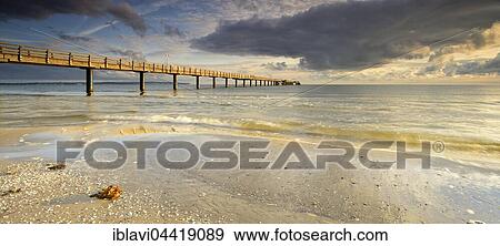 Sea pier, first morning light, Binz Sea Resort, Rügen, Mecklenburg-Western Pomerania, Germany, Europe View Large Photo Image Stock Photo - Sea pier, first morning light, Binz Sea Resort, Rügen, Mecklenburg-Western Pomerania, Germany, Europe. Fotosearch