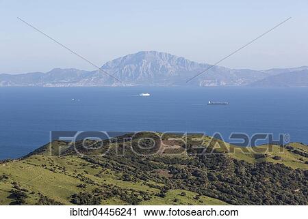 Sierra del Cabrito and the Strait of Gibraltar with Jebel Musa in Morocco, Cadiz, Andalusia, Spain, Europe View Large Photo Image Stock Image - Sierra del Cabrito and the Strait of Gibraltar with Jebel Musa in Morocco, Cadiz, Andalusia, Spain, Europe. Fotosearch