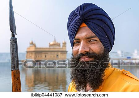 Sikh guard in front of the Golden Temple, Amritsar, Punjab, North India, India, Asia View Large Photo Image Stock Photo - Sikh guard in front of the Golden Temple, Amritsar, Punjab, North India, India, Asia. Fotosearch