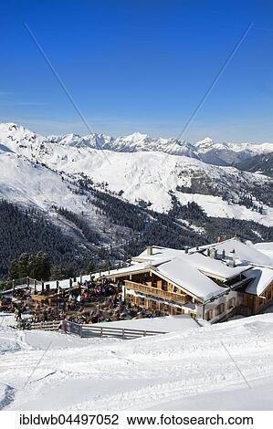 Skiers at Holzalm, Skiing area Hochfügen, Zillertal, Tyrol, Austria, Europe View Large Photo Image Stock Image - Skiers at Holzalm, Skiing area Hochfügen, Zillertal, Tyrol, Austria, Europe. Fotosearch