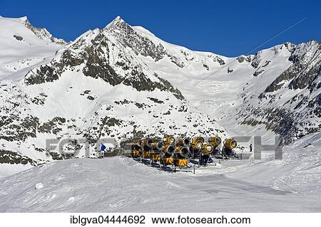 Snow cannons on ski slope, Aletsch Arena ski resort, Bettmeralp, Valais Canton, Switzerland, Europe View Large Photo Image Stock Image - Snow cannons on ski slope, Aletsch Arena ski resort, Bettmeralp, Valais Canton, Switzerland, Europe. Fotosearch