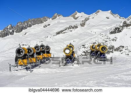 Stock Photograph - Snow cannons on ski slope, Aletsch Arena ski resort, Bettmeralp, Valais Canton, Switzerland, Europe. Fotosearch