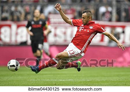 Stock Photography - Soccer, Rafinha, with ball, Bayern Munich, Allianz Arena, Munich, Bavaria, Germany, Europe. Fotosearch