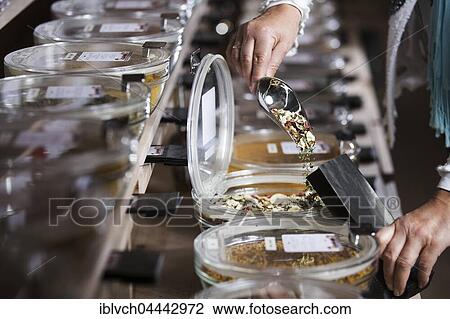 Spice mixture being poured into paper bag, dried garlic, parsley, paprika, chilli, basil and oregano View Large Photo Image Stock Image - Spice mixture being poured into paper bag, dried garlic, parsley, paprika, chilli, basil and oregano. Fotosearch