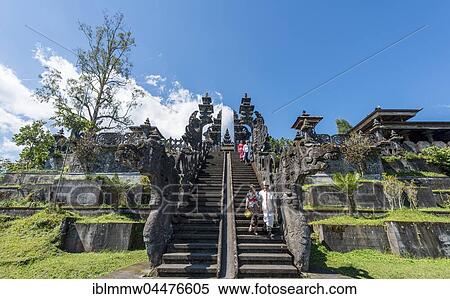 Split gate, devout Balinese at Mother Temple, Besakih temple, Pura Agung Besakih Penetaran, Bali-Hinduism, Banjar Besakih, Bali, Indonesia, Asia View Large Photo Image Stock Photography - Split gate, devout Balinese at Mother Temple, Besakih temple, Pura Agung Besakih Penetaran, Bali-Hinduism, Banjar Besakih, Bali, Indonesia, Asia. Fotosearch