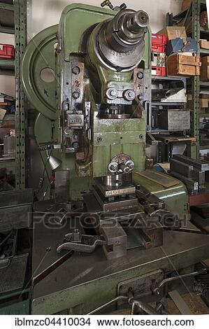 Squeezing machine from the 1950s for the production of tin toys, tin toys, Emskirchen, Brunn, Upper Franconia, Bavaria, Germany, Europe View Large Photo Image Picture - Squeezing machine from the 1950s for the production of tin toys, tin toys, Emskirchen, Brunn, Upper Franconia, Bavaria, Germany, Europe. Fotosearch