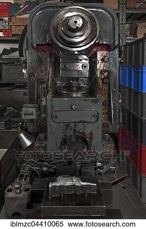 Stock Photography - squeezing machine from the 1950s with mold and ready pressed elephants, tin toys, Emskirchen, Brunn, Upper Franconia, Bavaria, Germany, Europe. Fotosearch