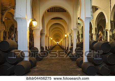 Stacked oak barrels in the wine cellar La Mezquita, winery Bodega Fundador Pedro Domecq, Jerez de la Frontera, Cadiz province, Andalusia, Spain, Europe *** IMPORTANT: Restriction: Calendar Use in Germany, Austria, Switzerland from Jan 1, 2019 to Dec... View Large Photo Image Stock Photography - Stacked oak barrels in the wine cellar La Mezquita, winery Bodega Fundador Pedro Domecq, Jerez de la Frontera, Cadiz province, Andalusia, Spain, Europe *** IMPORTANT: Restriction: Calendar Use in Germany, Austria, Switzerland from Jan 1, 2019 to Dec.... Fotosearch