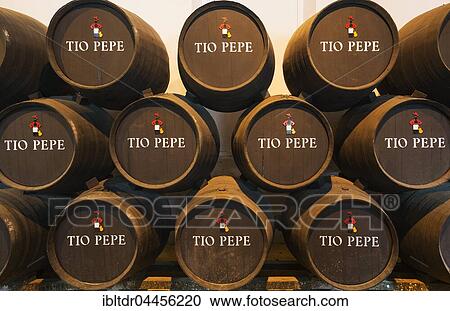 Stacked oak barrels with the famous Tio Pepe sherry, winery winery Bodega Gonzalez Byass, Jerez de la Frontera, Cadiz province, Andalusia, Spain, Europe View Large Photo Image Stock Image - Stacked oak barrels with the famous Tio Pepe sherry, winery winery Bodega Gonzalez Byass, Jerez de la Frontera, Cadiz province, Andalusia, Spain, Europe. Fotosearch