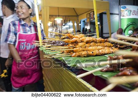 Stand, Saleswoman, skewers at the Night Market, Krabi Town, Krabi Province, Thailand, Asia View Large Photo Image Stock Image - Stand, Saleswoman, skewers at the Night Market, Krabi Town, Krabi Province, Thailand, Asia. Fotosearch
