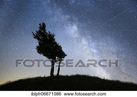 Stock Photograph - Starry sky with milky way, Switzerland, Europe. Fotosearch