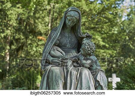 Statue, Mother with two children, Tomb in the main cemetery, Frankfurt am Main, Hesse, Germany, Europe View Large Photo Image Stock Photography - Statue, Mother with two children, Tomb in the main cemetery, Frankfurt am Main, Hesse, Germany, Europe. Fotosearch