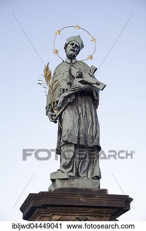 Stock Image - Statue of John of Nepomuk on Charles Bridge, Prague, Czech Republic, Europe. Fotosearch