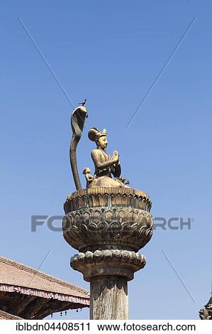 Statue of king Yoganarendra Malla with snake and bird, Durbar square, destroyed at earthquake April 2015, Patan, Nepal, Asia View Large Photo Image Stock Image - Statue of king Yoganarendra Malla with snake and bird, Durbar square, destroyed at earthquake April 2015, Patan, Nepal, Asia. Fotosearch