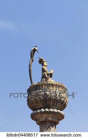 Statue of king Yoganarendra Malla with snake and bird, Durbar square, destroyed at earthquake April 2015, Patan, Nepal, Asia View Large Photo Image Stock Photo - Statue of king Yoganarendra Malla with snake and bird, Durbar square, destroyed at earthquake April 2015, Patan, Nepal, Asia. Fotosearch