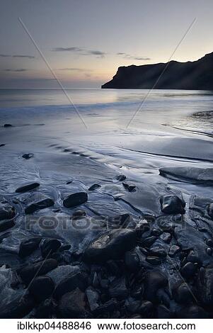 Stock Photograph - Stones in the sand on the beach of Talisker Bay, Isle of Skye, Scotland, United Kingdom, Europe. Fotosearch