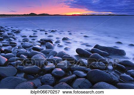 Stony beach in Northumberland, Great Britain View Large Photo Image Stock Photo - Stony beach in Northumberland, Great Britain. Fotosearch