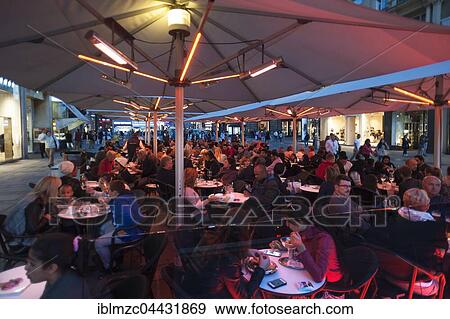 Street cafe, pedestrian area, evening, Vienna, Austria, Europe View Large Photo Image Stock Photo - Street cafe, pedestrian area, evening, Vienna, Austria, Europe. Fotosearch
