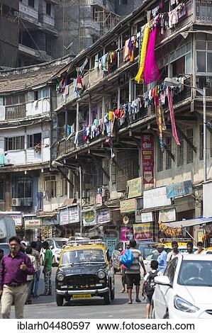 Stock Photo - Street Scene, old houses, washing hanging, district Bhuleshwar, Mumbai, Maharashtra, India, Asia. Fotosearch