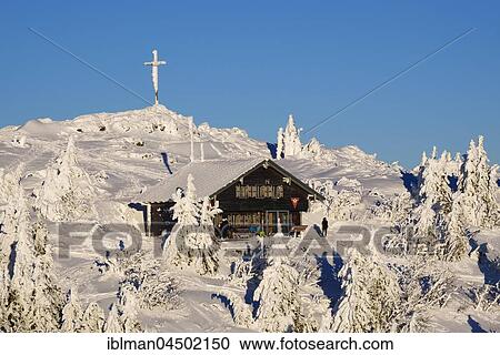 Summit cross on Zwieseler Cottage in Snow, Big Arber, Natural Preserve Bavarian Forest, Lower Bavaria, Bavaria, Germany, Europe View Large Photo Image Stock Image - Summit cross on Zwieseler Cottage in Snow, Big Arber, Natural Preserve Bavarian Forest, Lower Bavaria, Bavaria, Germany, Europe. Fotosearch