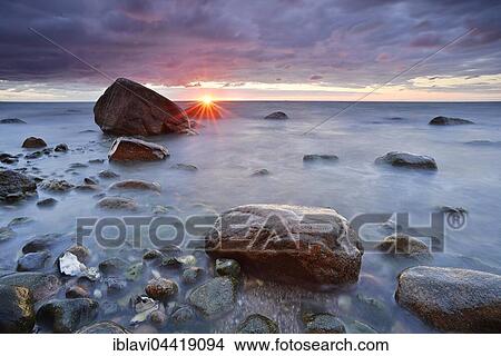 Sunrise, Baltic Sea, boulders in water, Jasmund National Park, Rügen, Mecklenburg-Western Pomerania, Germany, Europe View Large Photo Image Picture - Sunrise, Baltic Sea, boulders in water, Jasmund National Park, Rügen, Mecklenburg-Western Pomerania, Germany, Europe. Fotosearch