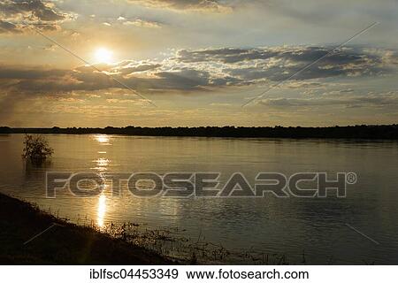 Sunset, River Zambezi, Katima Mulilo, Caprivi Strip, Namibia, Africa View Large Photo Image Stock Photo - Sunset, River Zambezi, Katima Mulilo, Caprivi Strip, Namibia, Africa. Fotosearch