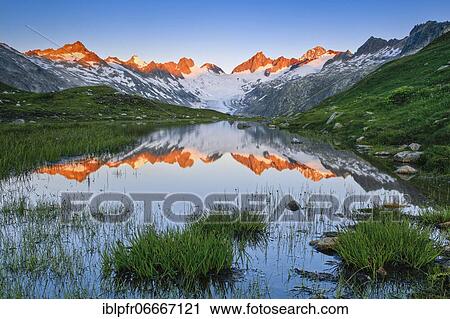 Stock Image - Swiss Alps (m) Summer, Oberaar glacier, Oberaarhorn, 3638 m, Finsteraarhorn, 4274m, Bernese Oberland, Bern, Switzerland, Europe. Fotosearch
