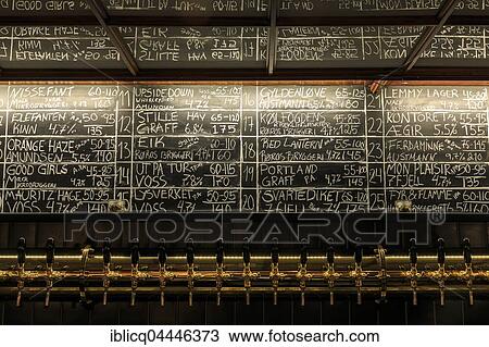 Stock Image - Tap and price list, Ølhallen, pub, Tromso, Province Troms, Norway, Europe. Fotosearch