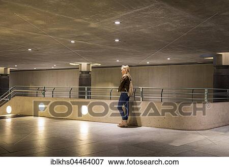 Stock Photo - Teenager, young girl alone, entrance to underground station, Berlin, Germany, Europe. Fotosearch