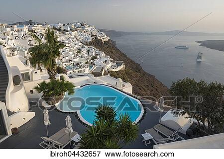 Terrace with hotel swimming pool, view of city and ocean, Firá, Santorini, Cyclades, Greece, Europe View Large Photo Image Stock Photo - Terrace with hotel swimming pool, view of city and ocean, Firá, Santorini, Cyclades, Greece, Europe. Fotosearch