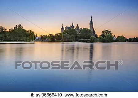 The Schwerin Castle at Lake Schwerin at sunset, Schwerin, Mecklenburg-Western Pomerania, Germany, Europe View Large Photo Image Stock Image - The Schwerin Castle at Lake Schwerin at sunset, Schwerin, Mecklenburg-Western Pomerania, Germany, Europe. Fotosearch