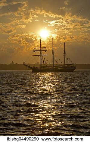 Three-masted sailing ship in front of sunset, Kieler Woche, Kiel, Schleswig-Holstein, Germany, Europe View Large Photo Image Stock Image - Three-masted sailing ship in front of sunset, Kieler Woche, Kiel, Schleswig-Holstein, Germany, Europe. Fotosearch