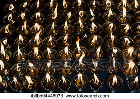 Tibetan butter lamps with burning flames, religious use, Kathmandu, Nepal, Asia View Large Photo Image Stock Photo - Tibetan butter lamps with burning flames, religious use, Kathmandu, Nepal, Asia. Fotosearch