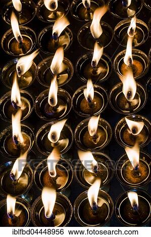Tibetan butter lamps with burning flames, religious use, Kathmandu, Nepal, Asia View Large Photo Image Stock Photograph - Tibetan butter lamps with burning flames, religious use, Kathmandu, Nepal, Asia. Fotosearch
