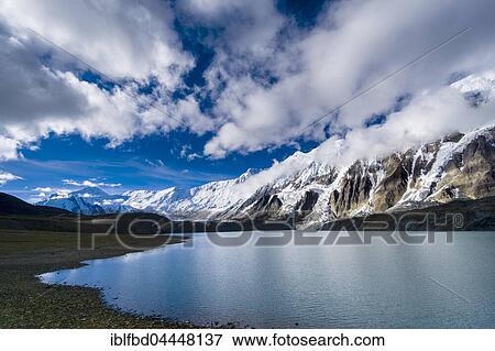 Tilicho Lake with snow-covered mountains, Manang, Manang District, Nepal, Asia View Large Photo Image Stock Photo - Tilicho Lake with snow-covered mountains, Manang, Manang District, Nepal, Asia. Fotosearch