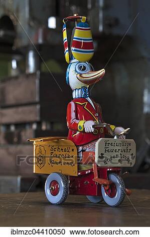 Tin Toys from the 1950s, finished duck as a firefighter in front of an old squeezing machine in the factory, tin toys, Emskirchen, Brunn, Upper Franconia, Bavaria, Germany, Europe View Large Photo Image Stock Image - Tin Toys from the 1950s, finished duck as a firefighter in front of an old squeezing machine in the factory, tin toys, Emskirchen, Brunn, Upper Franconia, Bavaria, Germany, Europe. Fotosearch