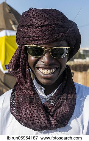 Stock Photo - Toubou beduin with sunglasses, portrait, N'Djamena, Chad, Africa. Fotosearch