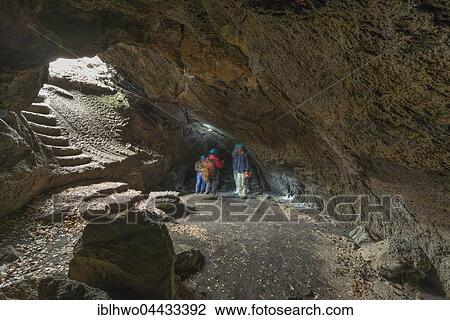 Tourists in the Grotta dei Ladroni lava cave, created by the eruption of 1865, northeast flank of Mount Etna, Sicily, Italy, Europe View Large Photo Image Stock Image - Tourists in the Grotta dei Ladroni lava cave, created by the eruption of 1865, northeast flank of Mount Etna, Sicily, Italy, Europe. Fotosearch