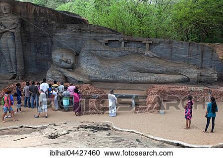 Tourists, Reclining Buddha, Gal Vihara, Sacred City, Polonnaruwa, North Central Province, Sri Lanka, Asia View Large Photo Image Stock Image - Tourists, Reclining Buddha, Gal Vihara, Sacred City, Polonnaruwa, North Central Province, Sri Lanka, Asia. Fotosearch