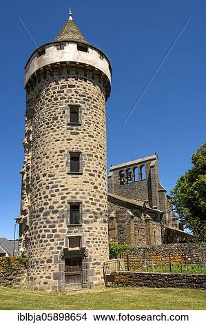 Tower of castle and the church Saint Gal, Roffiac, Saint Flour planeze, Cantal department, Auvergne-Rhone-Alpes, France, Europe View Large Photo Image Picture - Tower of castle and the church Saint Gal, Roffiac, Saint Flour planeze, Cantal department, Auvergne-Rhone-Alpes, France, Europe. Fotosearch