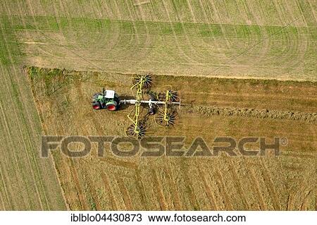 Tractor with hay rakes, agriculture, fields, Ruhr district, North Rhine-Westphalia, Germany, Europe View Large Photo Image Stock Image - Tractor with hay rakes, agriculture, fields, Ruhr district, North Rhine-Westphalia, Germany, Europe. Fotosearch