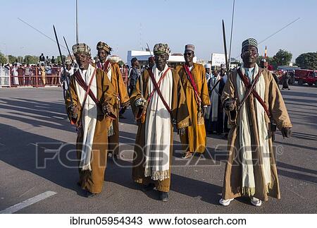 Traditional dressed Toubou men, dancing, tribal festival Place de la Nation, N'Djamena, Chad, Africa View Large Photo Image Stock Image - Traditional dressed Toubou men, dancing, tribal festival Place de la Nation, N'Djamena, Chad, Africa. Fotosearch