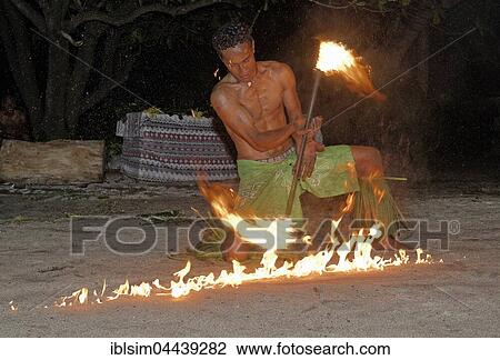 Traditional fire performer, Barefoot Island Lodge, Drawaqa Island, Fiji, Oceania View Large Photo Image Stock Image - Traditional fire performer, Barefoot Island Lodge, Drawaqa Island, Fiji, Oceania. Fotosearch