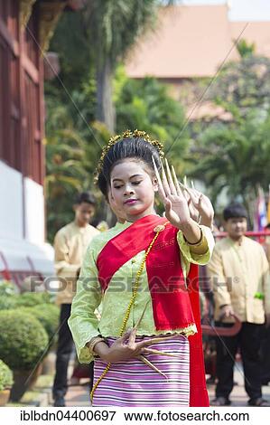 Traditional thai dancing at the Songkran Day Parade of Buddha statues, Thai New Year's festival, Chiang Mai, Thailand, Asia View Large Photo Image Stock Photo - Traditional thai dancing at the Songkran Day Parade of Buddha statues, Thai New Year's festival, Chiang Mai, Thailand, Asia. Fotosearch