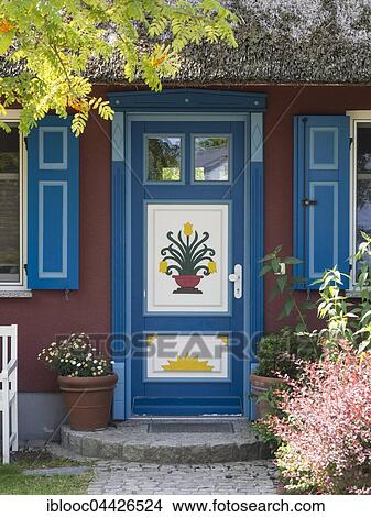 Traditionally painted door, thatched cottage, Ahrenshoop, Fischland-Darß-Zingst peninsula, Mecklenburg-Western Pomerania, Germany, Europe View Large Photo Image Picture - Traditionally painted door, thatched cottage, Ahrenshoop, Fischland-Darß-Zingst peninsula, Mecklenburg-Western Pomerania, Germany, Europe. Fotosearch